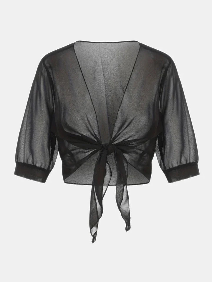 Airy women's sheer blouse with 3/4 sleeves and a tie-front, perfect for warm weather layering.