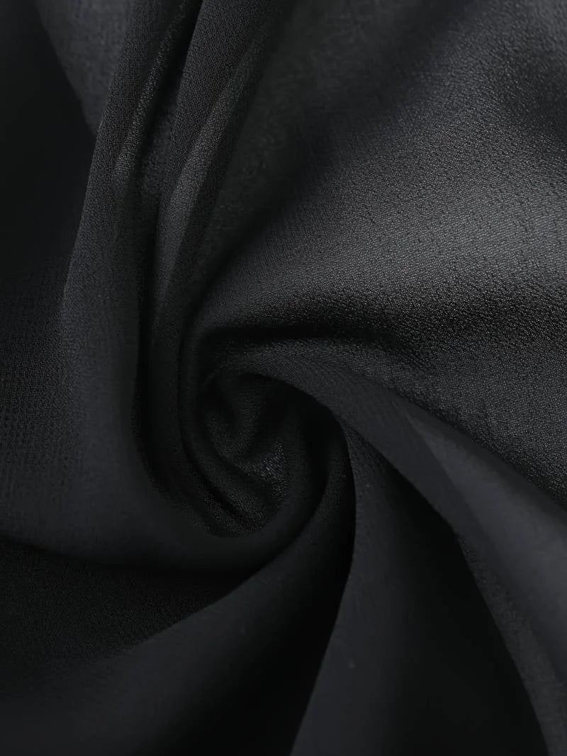 Modern women's sheer open-front blouse with 3/4 sleeves, a stylish tie-front top.