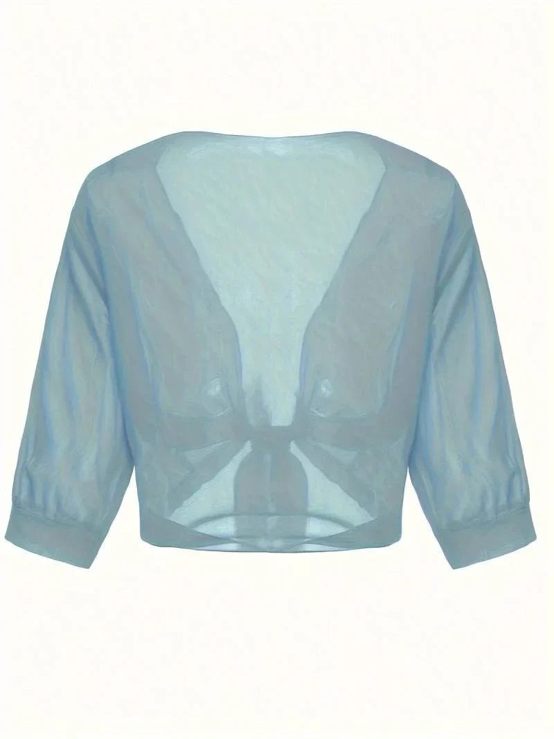 Chic layering piece: women's sheer 3/4 sleeve blouse with tie-front and open-front style.