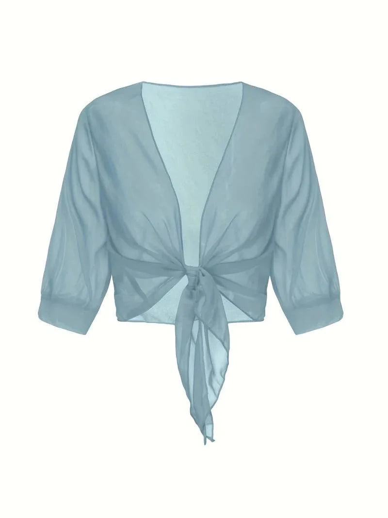 Comfortable women's sheer open-front blouse with 3/4 sleeves and a playful tie-front.
