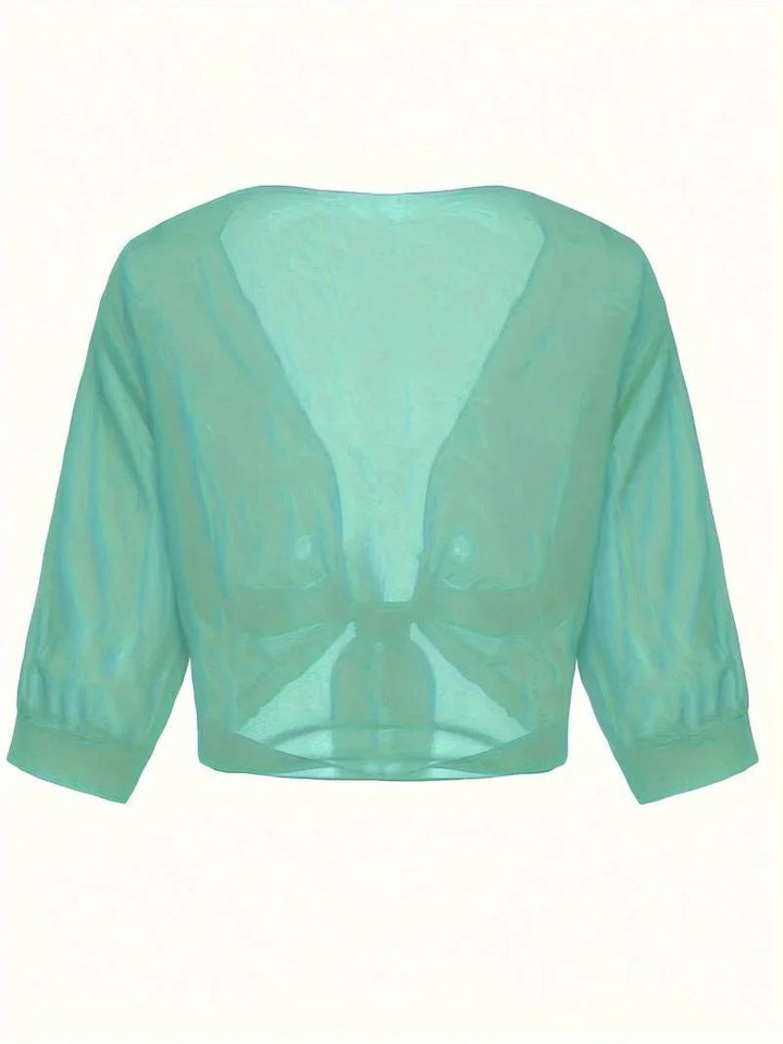 Sophisticated women's sheer blouse with 3/4 sleeves, tie-front, an elegant open-front top.