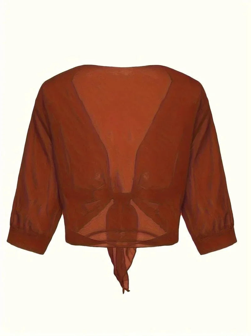 Women's sheer 3/4 sleeve blouse, a stylish tie-front top for a casual open-front look.