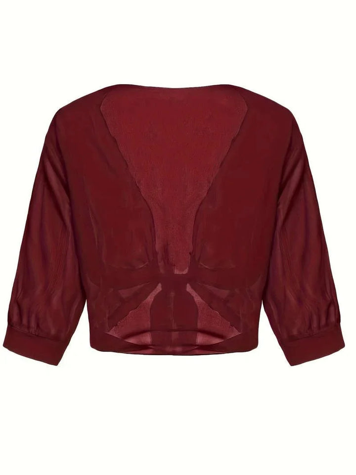 Stylish women's sheer 3/4 sleeve blouse with open-front and adjustable tie-front detail.