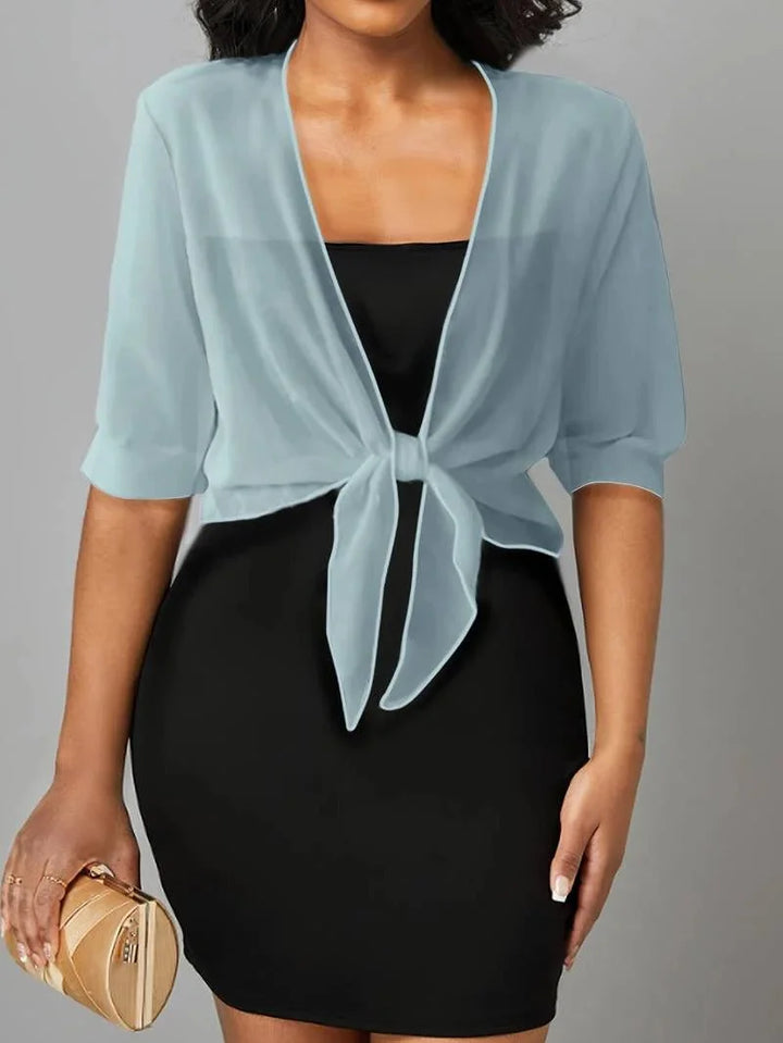 Chic open-front women's sheer blouse with 3/4 sleeves and a trendy tie-front detail.