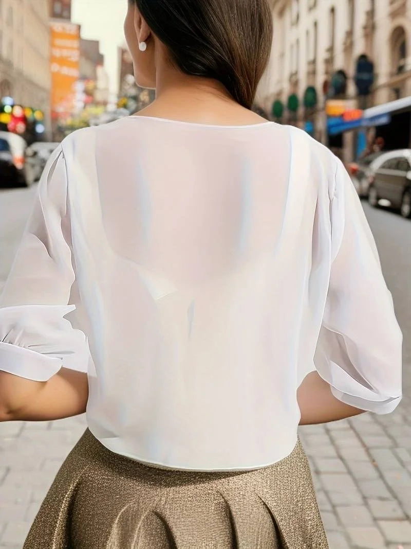 Summer-ready women's sheer tie-front blouse with comfortable 3/4 sleeves and open front.