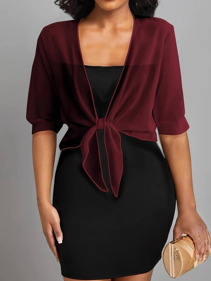 Lightweight women's sheer tie front bolero, a perfect cropped overlay for summer style and elegant outfits.