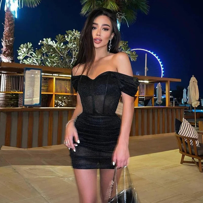 Women's shimmering off-shoulder ruched mini dress, perfect for girls' night out & parties. A dazzling short cocktail dress.