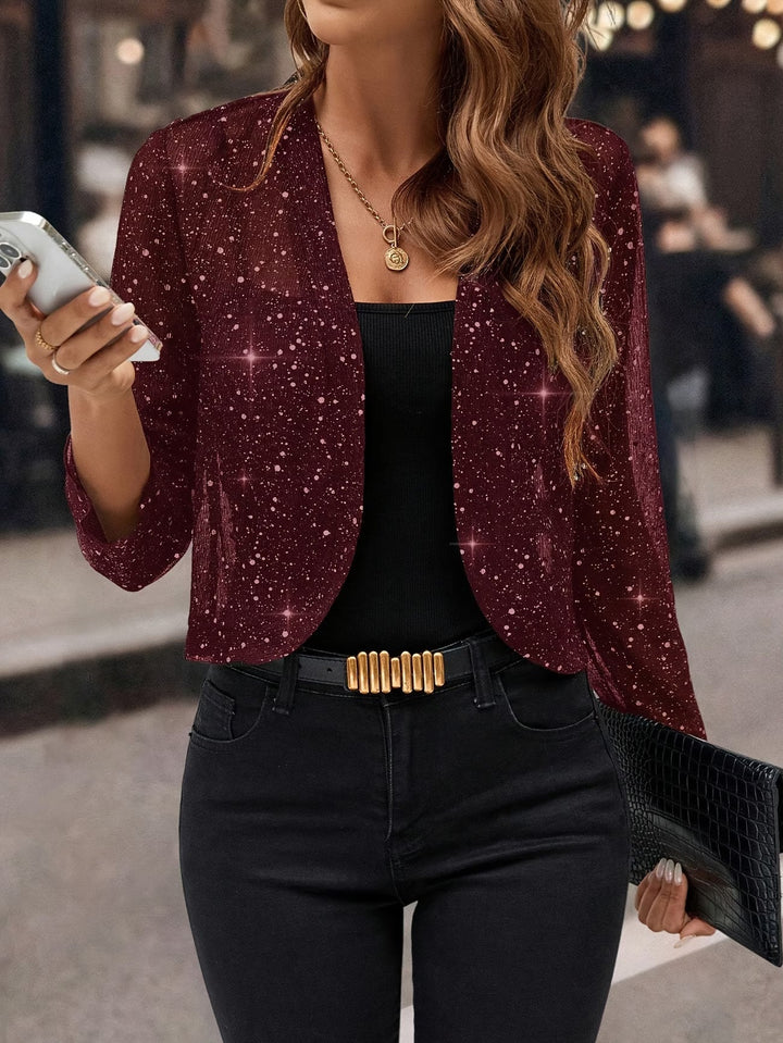 Fashionable women's sequin cardigan, a glamorous jacket for special occasions and party wear.