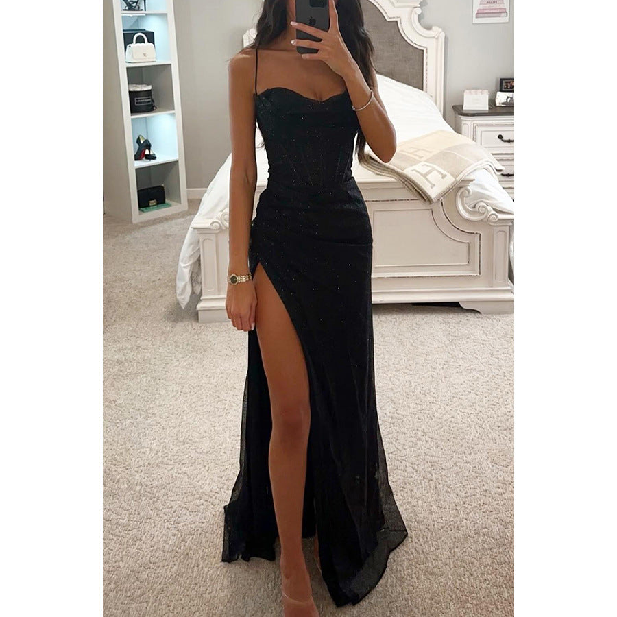 Glamorous women's sleeveless shimmering maxi dress with split hem. Perfect glitter gown for formal evening events.