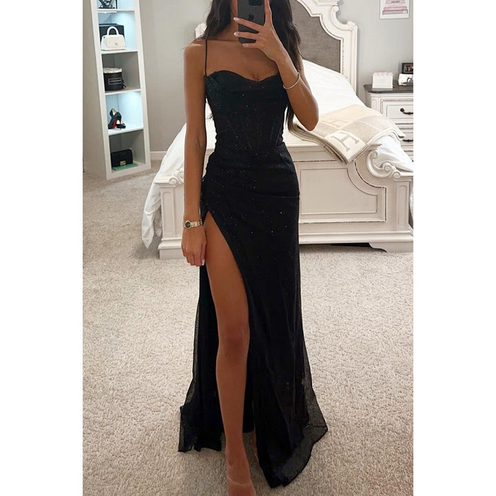 Glamorous women's sleeveless shimmering maxi dress with split hem. Perfect glitter gown for formal evening events.