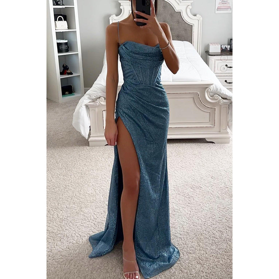 Elegant women's shimmering maxi party dress. Features a stylish split hem, ideal for special occasion evenings.