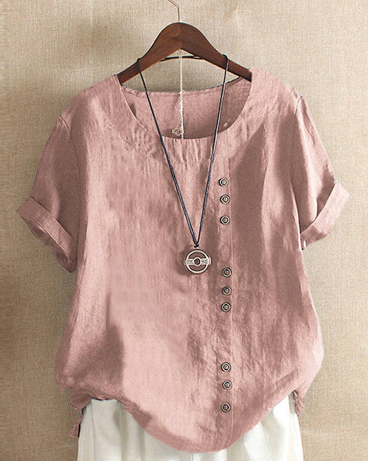 Women's short sleeve blouse with button details, perfect for effortless casual and everyday summer wear.