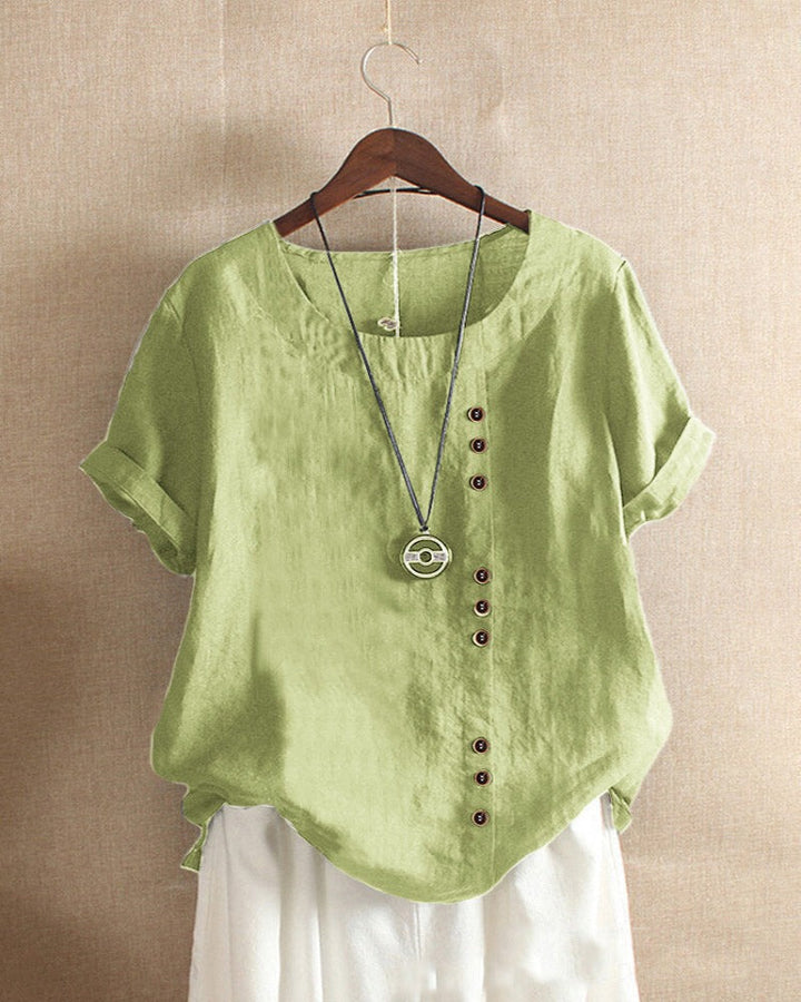 Fashionable women's short sleeve top with front button design, a versatile and relaxed fit for summer apparel.