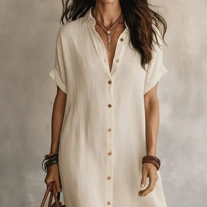 Stylish women's short sleeve midi shirt dress, button-front design, great for smart casual elegance.