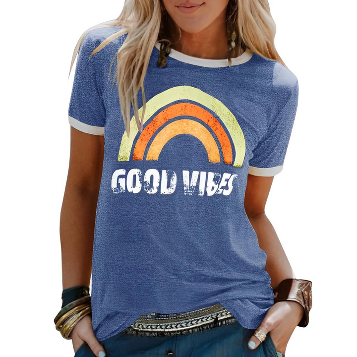 Colorful women's graphic tee featuring a bright rainbow design, perfect for summer casual wear.