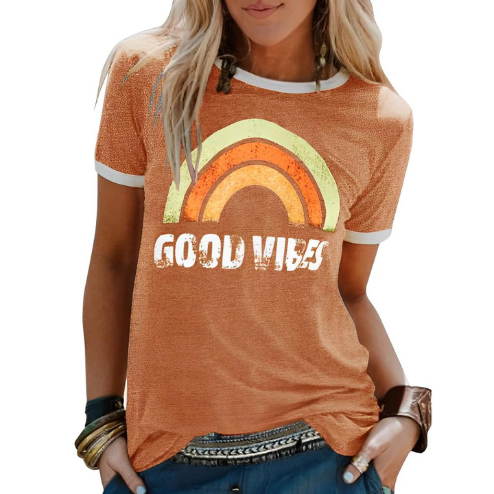 Comfortable women's everyday t-shirt with a positive vibe rainbow graphic and classic crew neck.