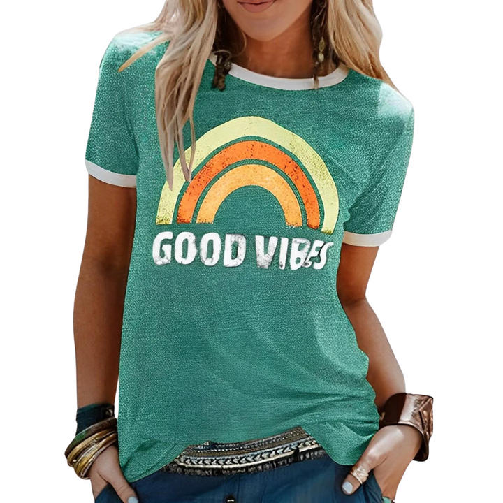 Positive vibe women's graphic t-shirt with a vibrant rainbow print, ideal for casual and comfortable wear.