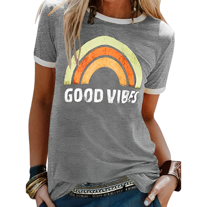 Women's colorful short-sleeve tee featuring a joyful rainbow graphic, a versatile crew neck everyday top.