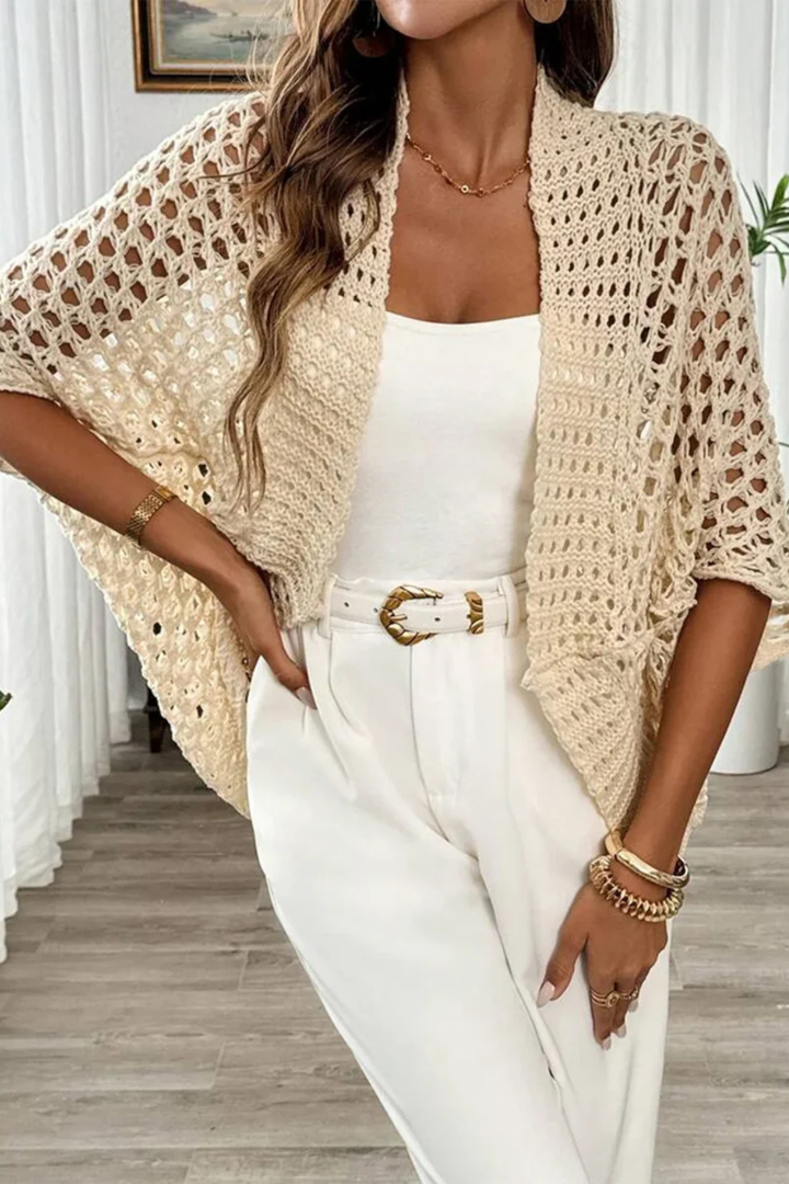 Lightweight women's summer knit, short sleeve open front crochet cardigan for warm weather layering.