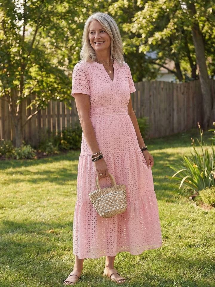 Women's short sleeve eyelet tiered midi dress, perfect for summer casual wear.
