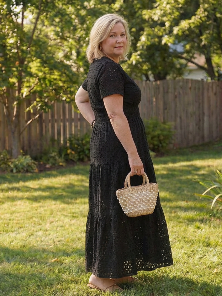 Casual women's comfortable short sleeve eyelet tiered midi dress, perfect for summer daily wear.