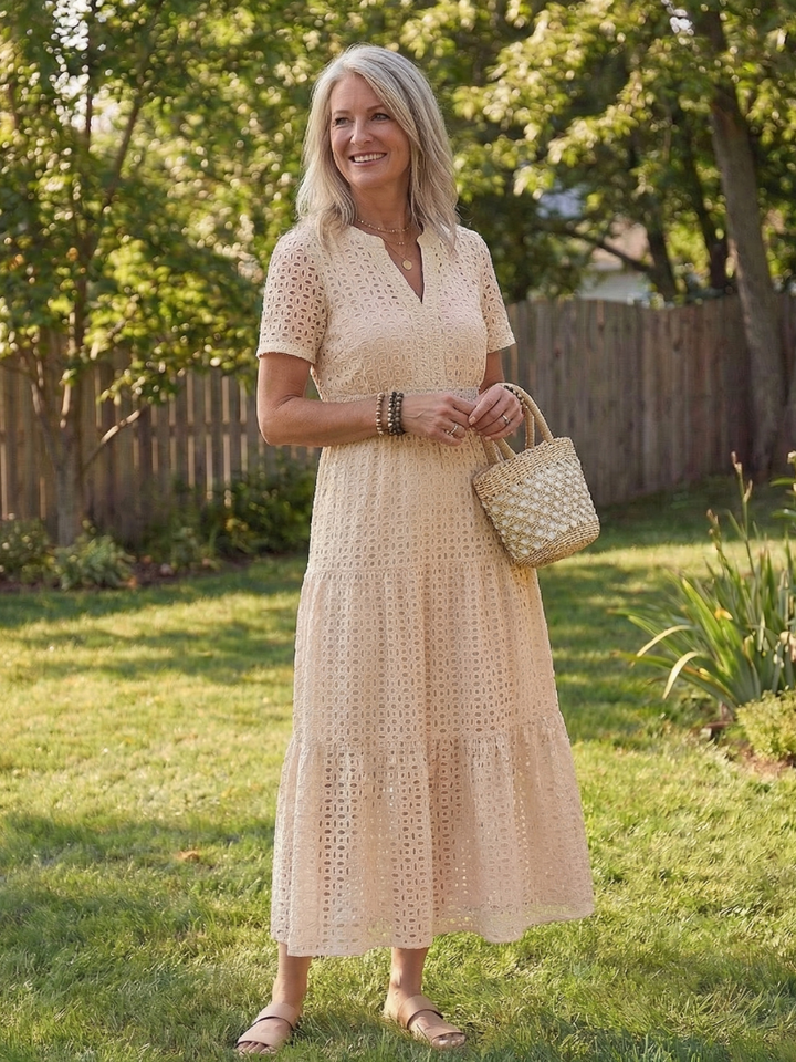 Women's short sleeve eyelet tiered midi dress, a versatile and comfortable summer/spring essential.