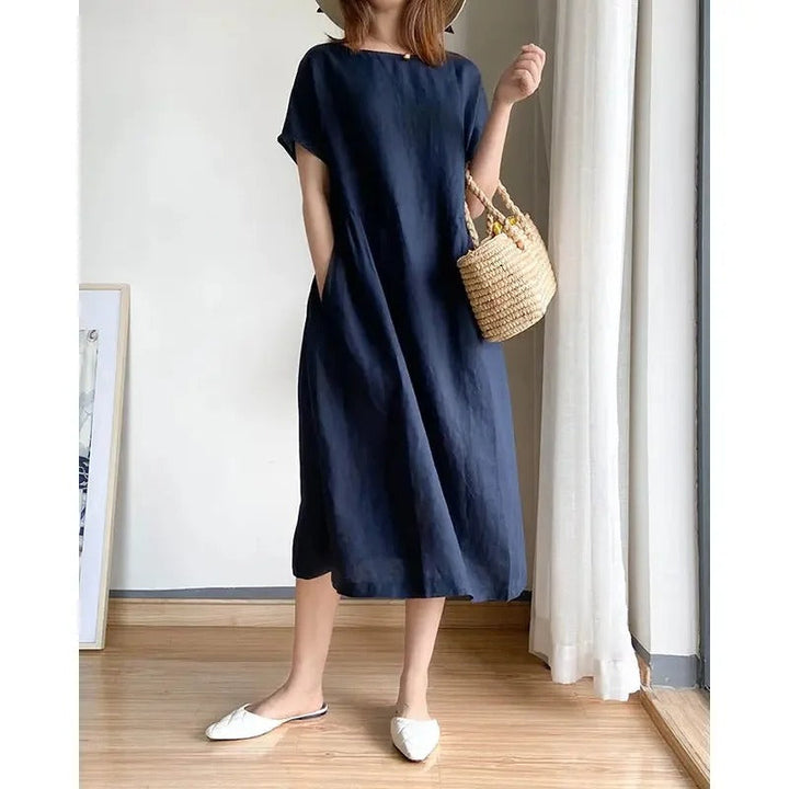 Summer women's short sleeve linen midi dress. Relaxed fit, casual, perfect for warm weather and everyday style.