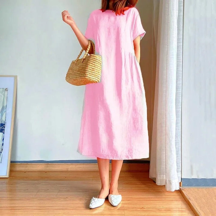 Versatile women's short sleeve linen midi dress with pockets. Great for casual, everyday, and stylish summer outfits.