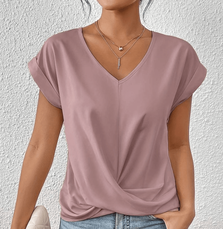 Chic women's twist front V-neck top in a relaxed fit, short sleeve design for versatile casual and elegant looks.