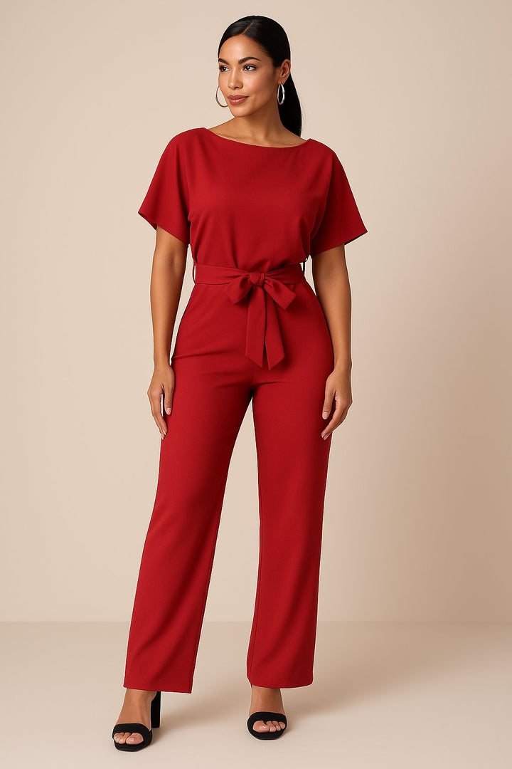 Modern women's wide-leg jumpsuit with short sleeves & belt for a chic, effortless fashion statement.