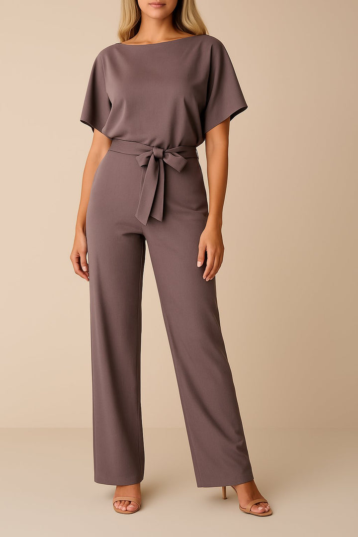 Effortless women's wide-leg jumpsuit with short sleeves and a stylish belt; ideal for any occasion.