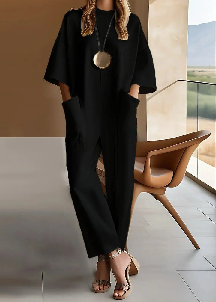 Versatile women's one-piece short-sleeve wide-leg jumpsuit, perfect for workwear or evening occasions.