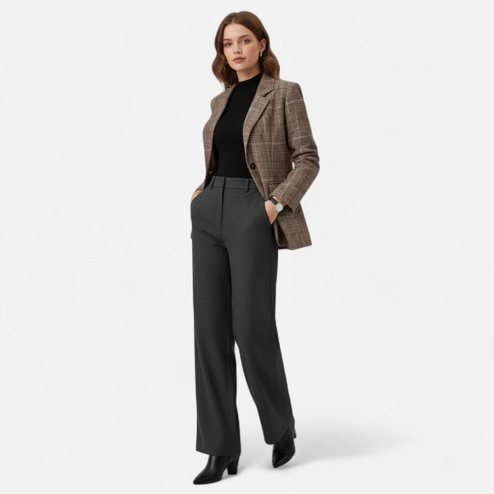 Elegant women's plaid blazer with a sophisticated single-breasted design, versatile for office and smart casual fashion.