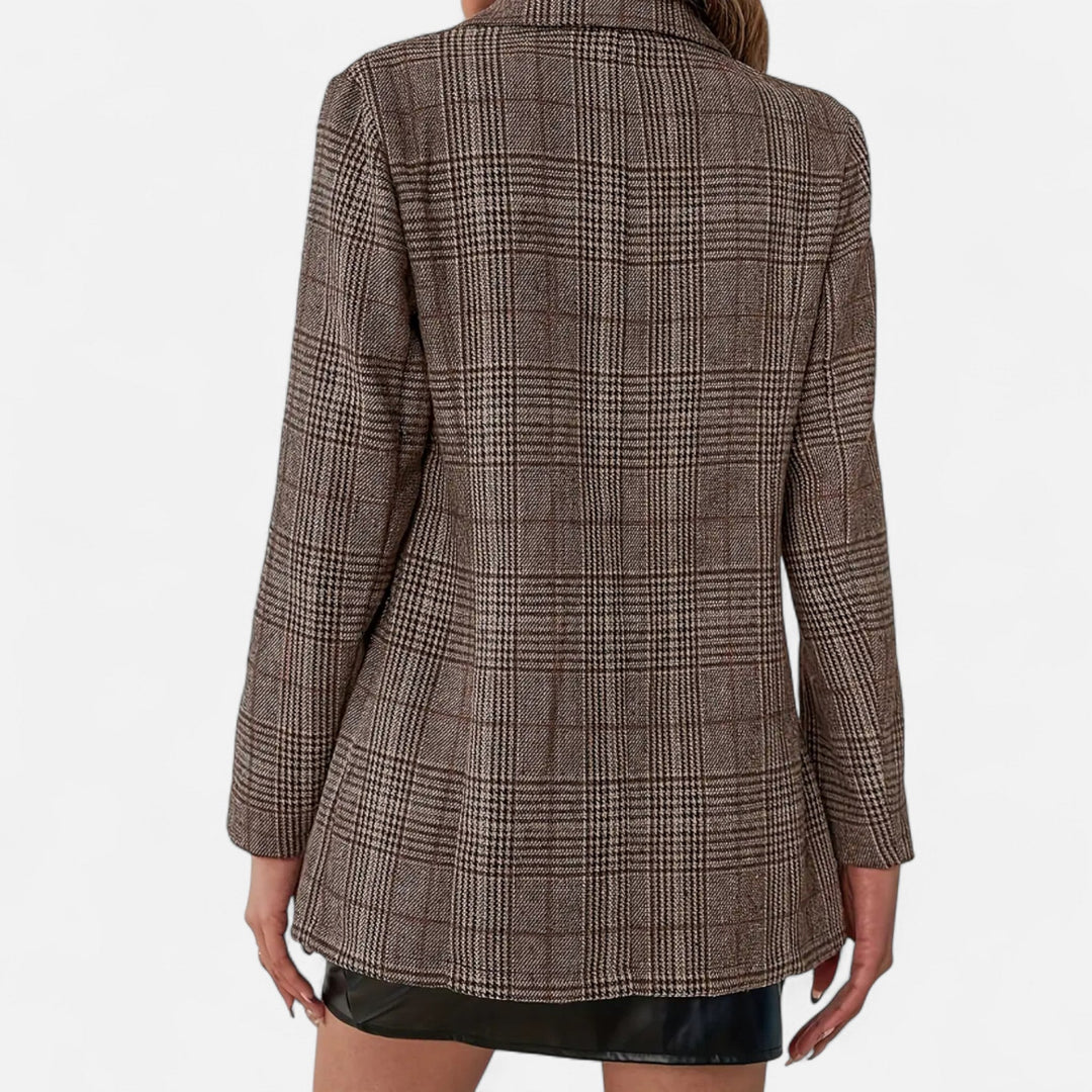 Stylish women's plaid blazer, single-breasted heritage outerwear, a sophisticated addition to professional attire.