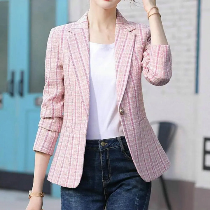 Structured women's tailored blazer with a single button closure, a versatile jacket for professional office style.