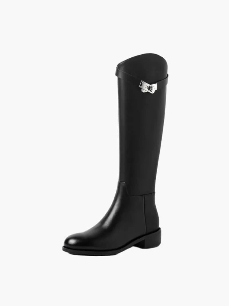 Women's sleek black knee-high fashion boots. Elegant, tall, structured footwear, perfect for autumn & winter style.