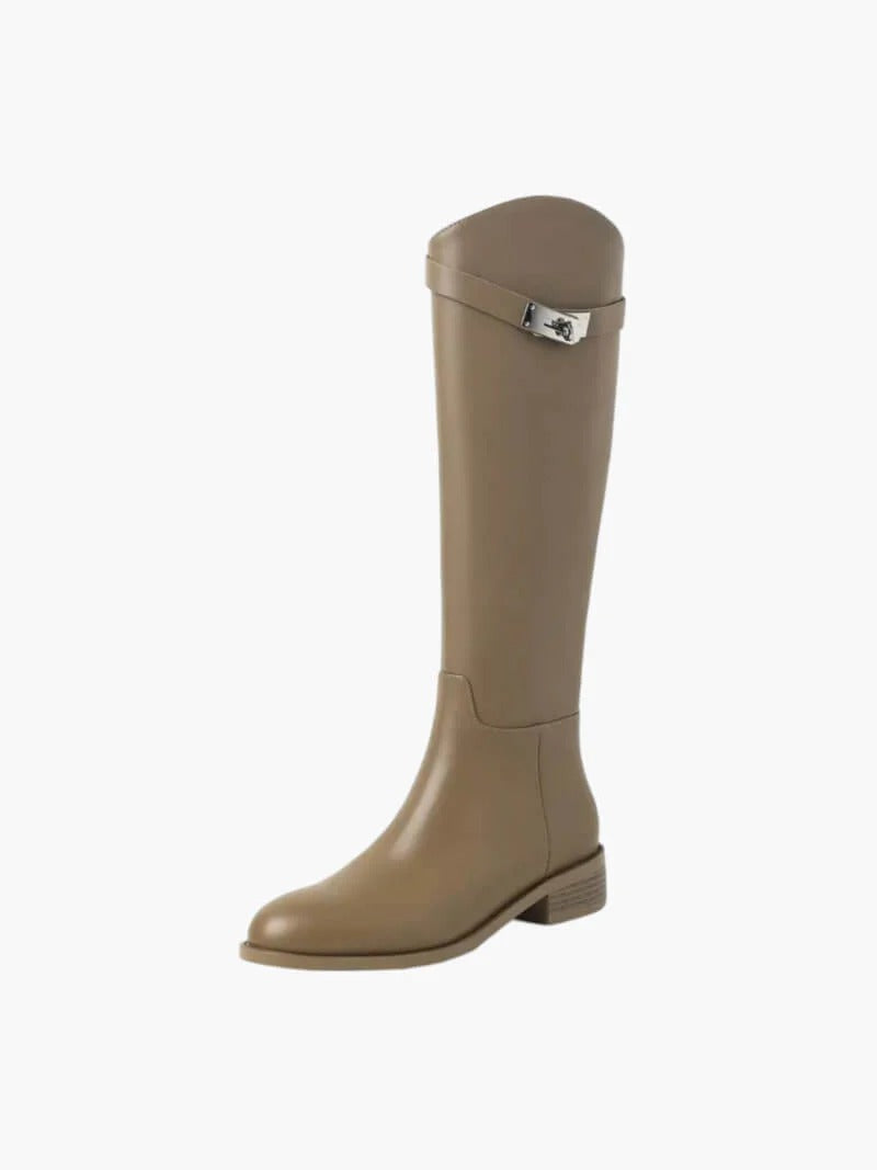 Statement women's sleek knee-high boots. Elegant, tall, and structured fashion footwear for autumn & winter style.