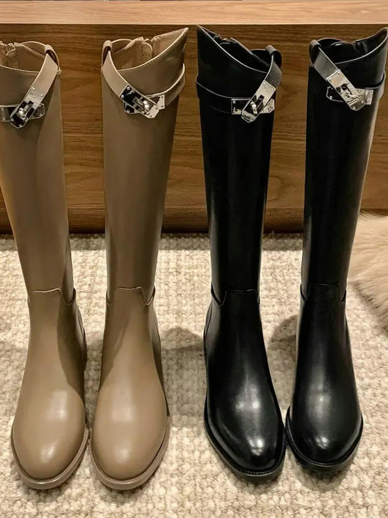 Structured women's sleek knee-high boots. Elegant tall fashion footwear, perfect for autumn & winter fashion.