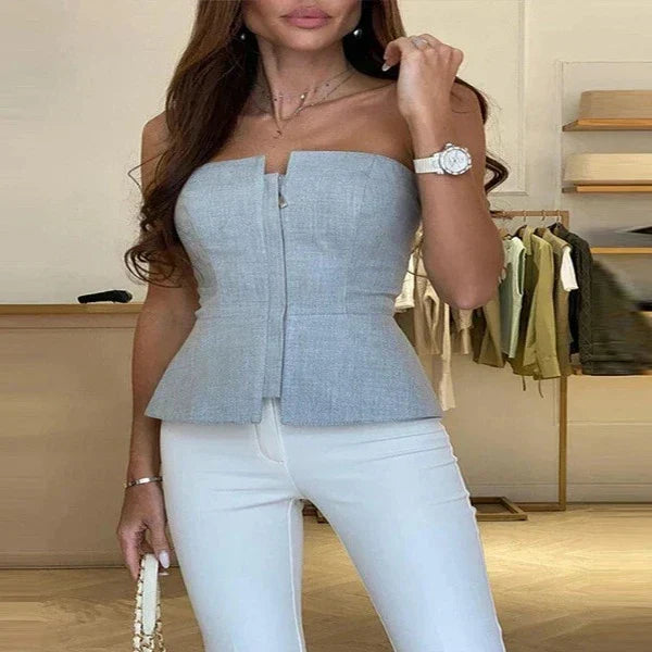 Slim fit women's tank top with a stylish scoop neck. Comfortable and sleek for everyday wear.