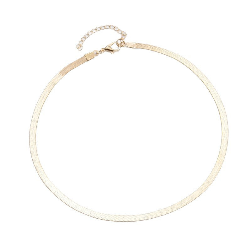 Dainty gold snake chain necklace. Versatile women's minimalist jewelry, perfect for stacking and fashion.