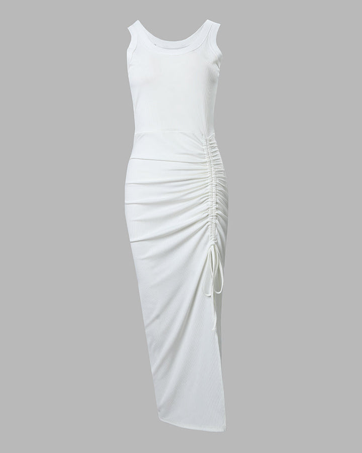 Flattering U-neck sleeveless bodycon dress for women, maxi length with elegant ruched side slit.