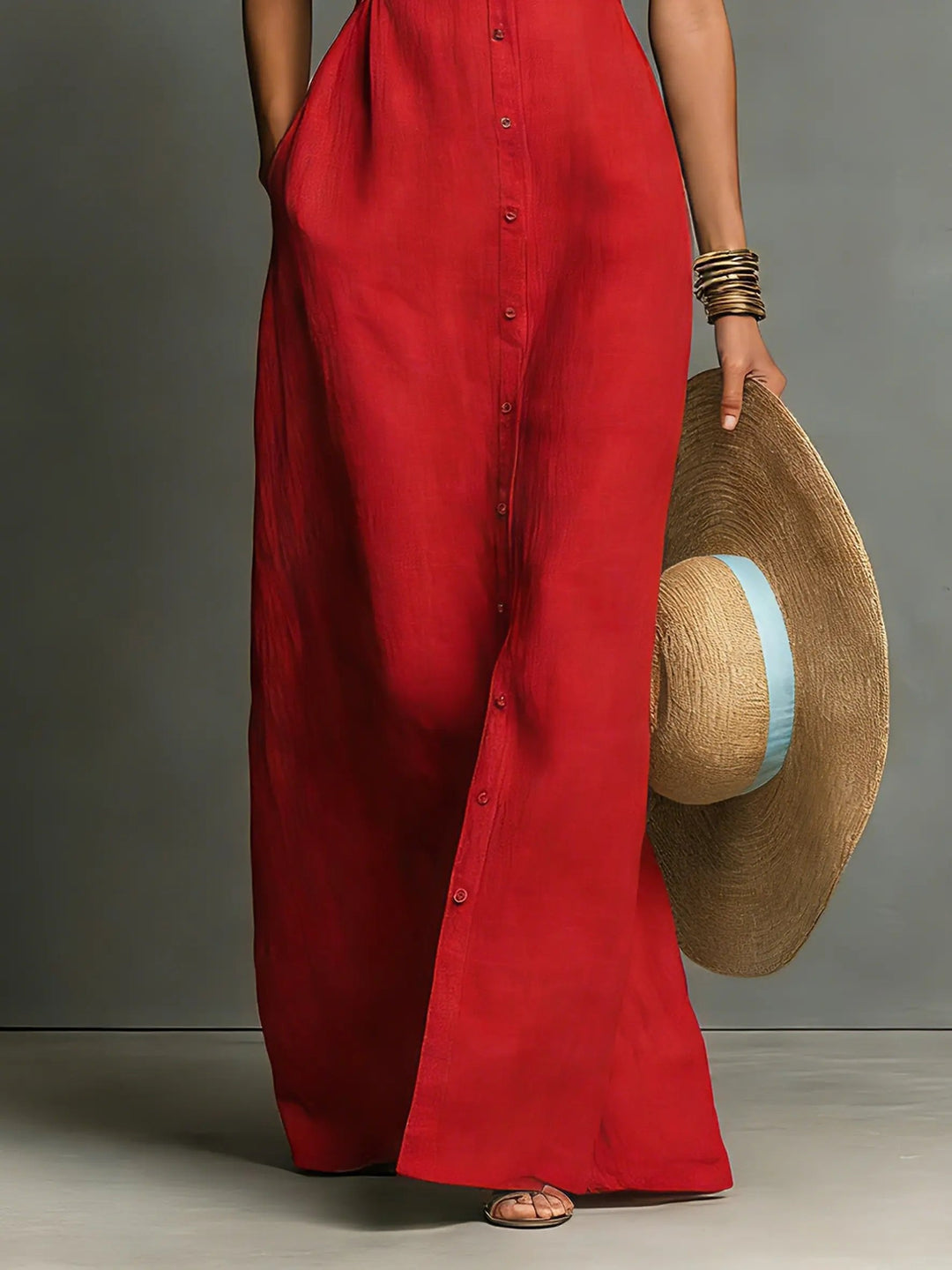 Stylish women's sleeveless maxi shirt dress with full button-front, great for everyday or office wear.