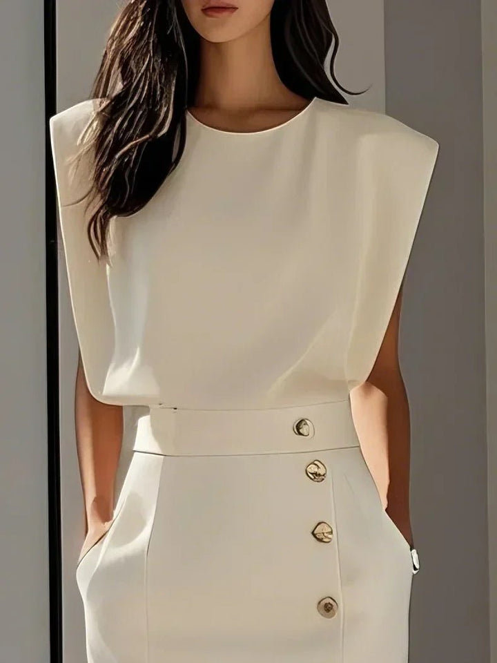 Comfortable & stylish women's sleeveless button-front midi dress. Round neck, suitable for elegant occasions.