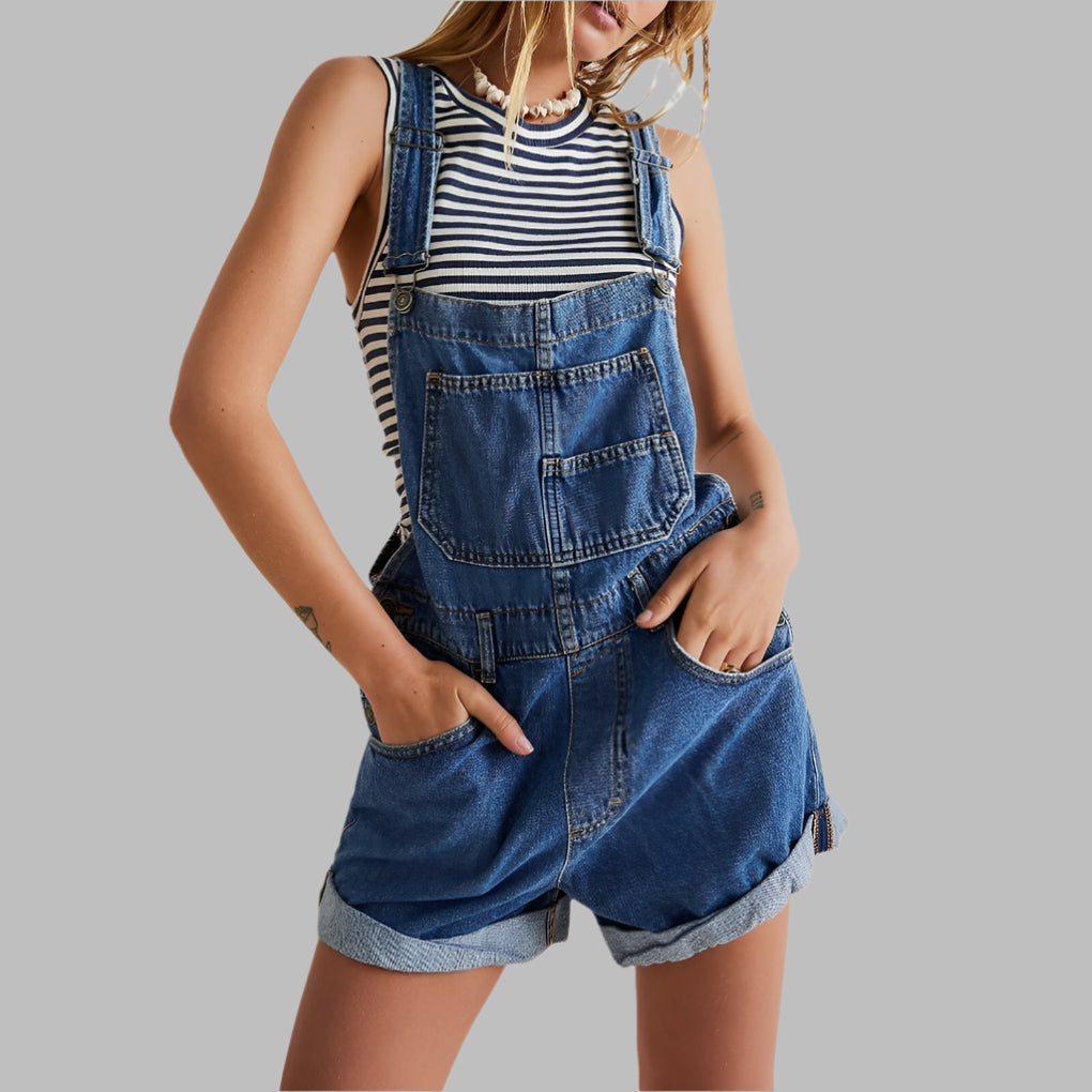Women's sleeveless denim jumpsuit in light wash, perfect for casual spring & summer style. Comfortable & chic.