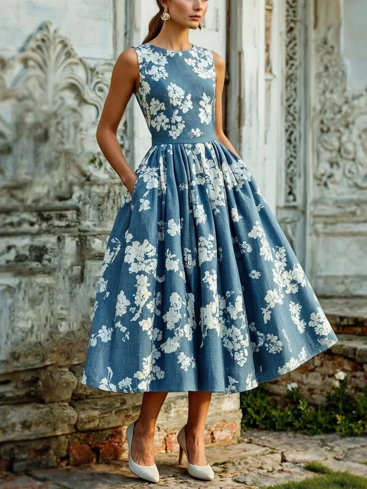 Women's sleeveless floral A-line midi dress, perfect for summer casual wear.