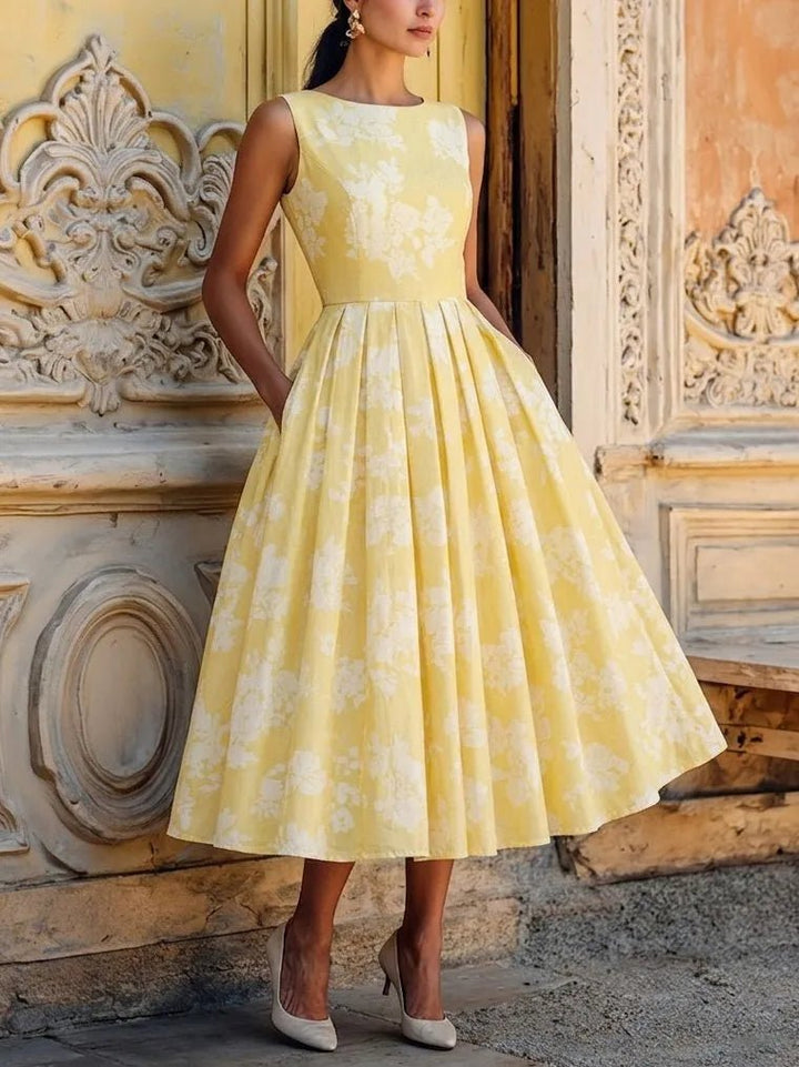 Vintage style women's sleeveless floral midi dress, a chic A-line design for any occasion.