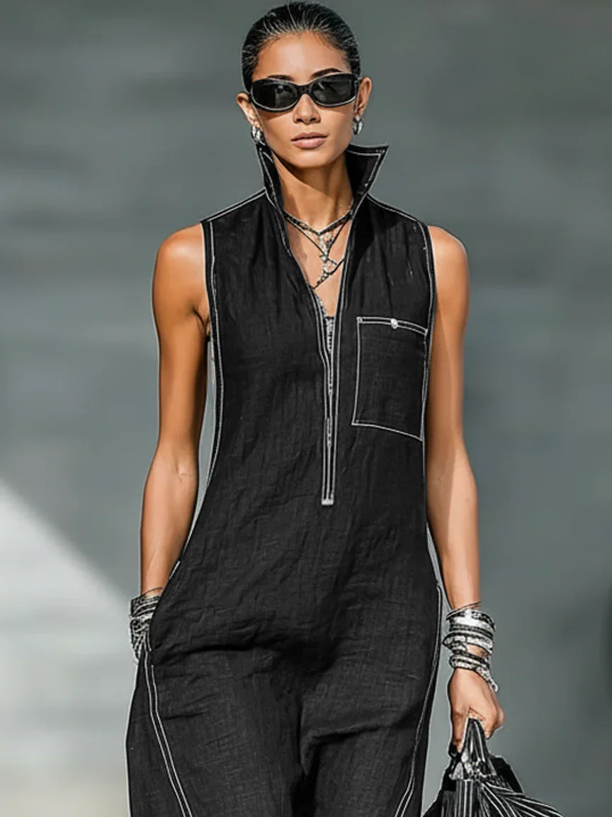 Women's casual elegant sleeveless jumpsuit with striking white trim. Full length and relaxed for summer fashion.