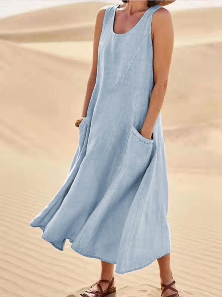 Comfortable women's sleeveless maxi dress with handy pockets. Great for casual everyday wear & summer style.
