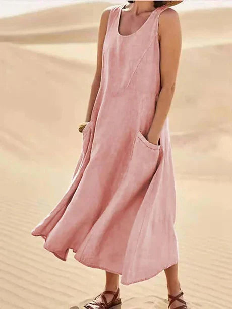 Elegant sleeveless midi dress for women, ideal as a flowy beach dress or vacation style outfit.
