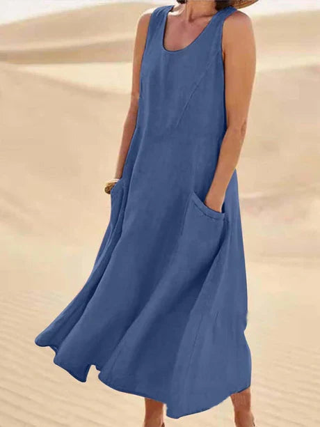 Front view of a women's flowy sleeveless midi dress, a perfect casual summer fashion staple.